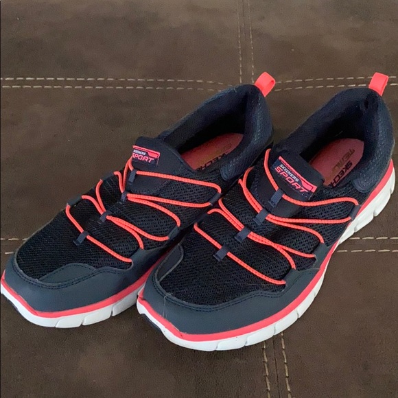 navy blue and pink sneakers